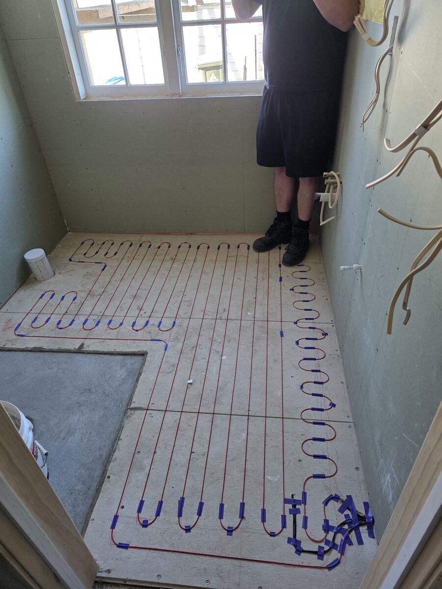 Warm Floor NZ heating cable laid out in a bathroom before the levelling screed goes on