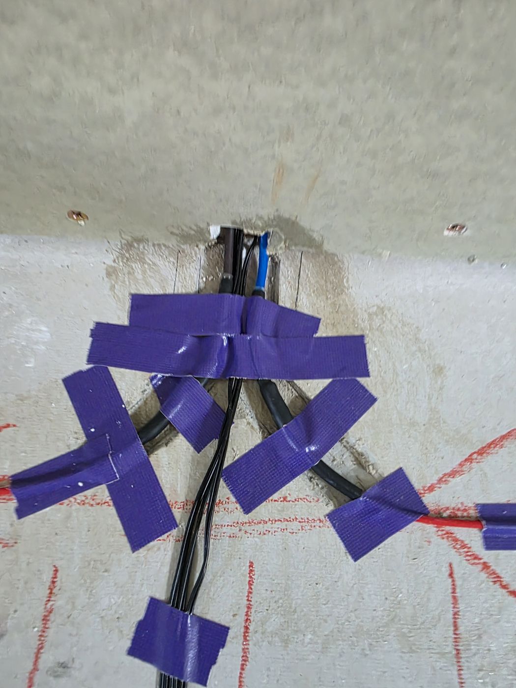 Electric underfloor heating by Floorheat NZ — the heating cable connections taped down and ready for the electrician, the same system we fit across Central Auckland