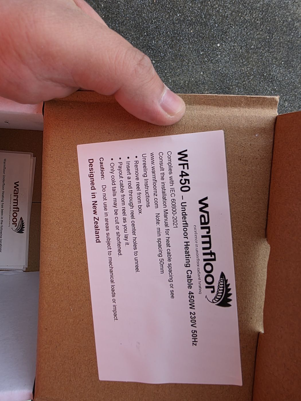 Electric underfloor heating by Floorheat NZ — the Warm Floor NZ heating cable we install, still in the box, the same system we fit across North Shore